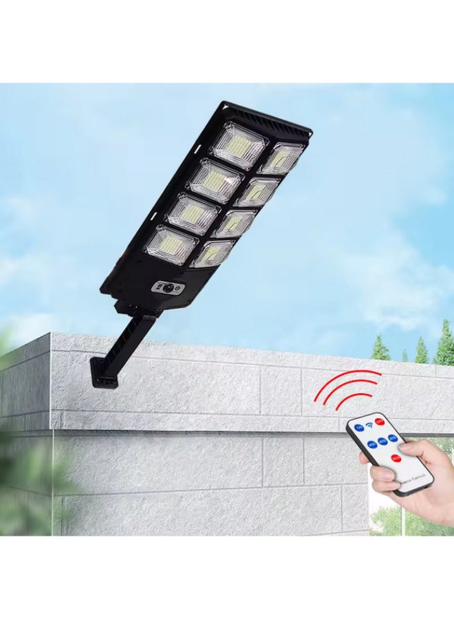 Solar-powered outdoor lights, 336 LED lights, IP65 waterproof rating, made of ABS plastic, equipped with a PIR motion sensor, suitable for gardens, walls, and streets. - Image 1